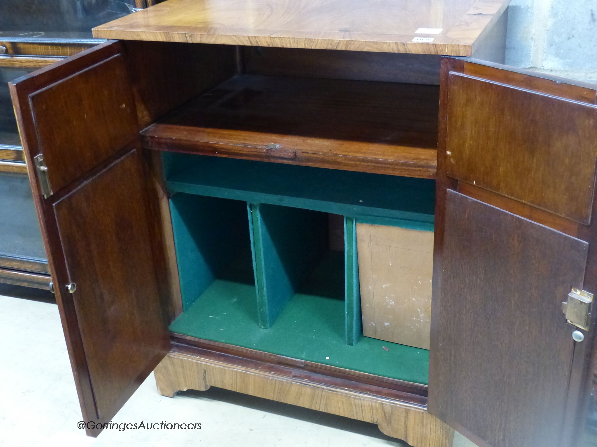 A small rosewood banded two door music cabinet, length 70cm, depth 53cm, height 87cm